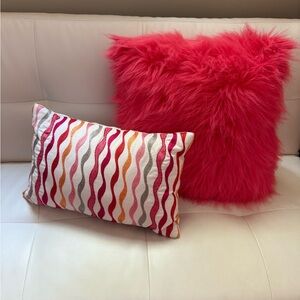 2 pink throw pillows